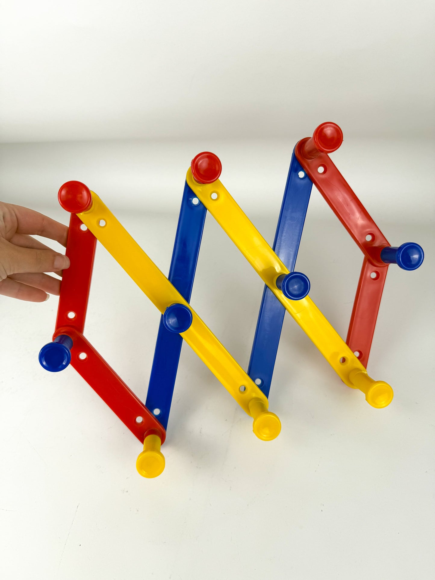 Vintage primary peg rack