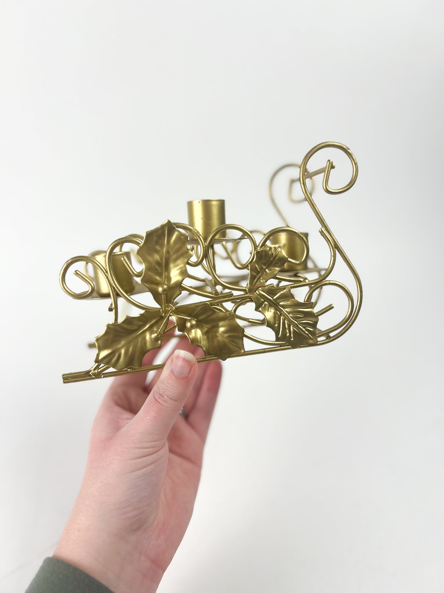 Brass sleigh candlestick holder