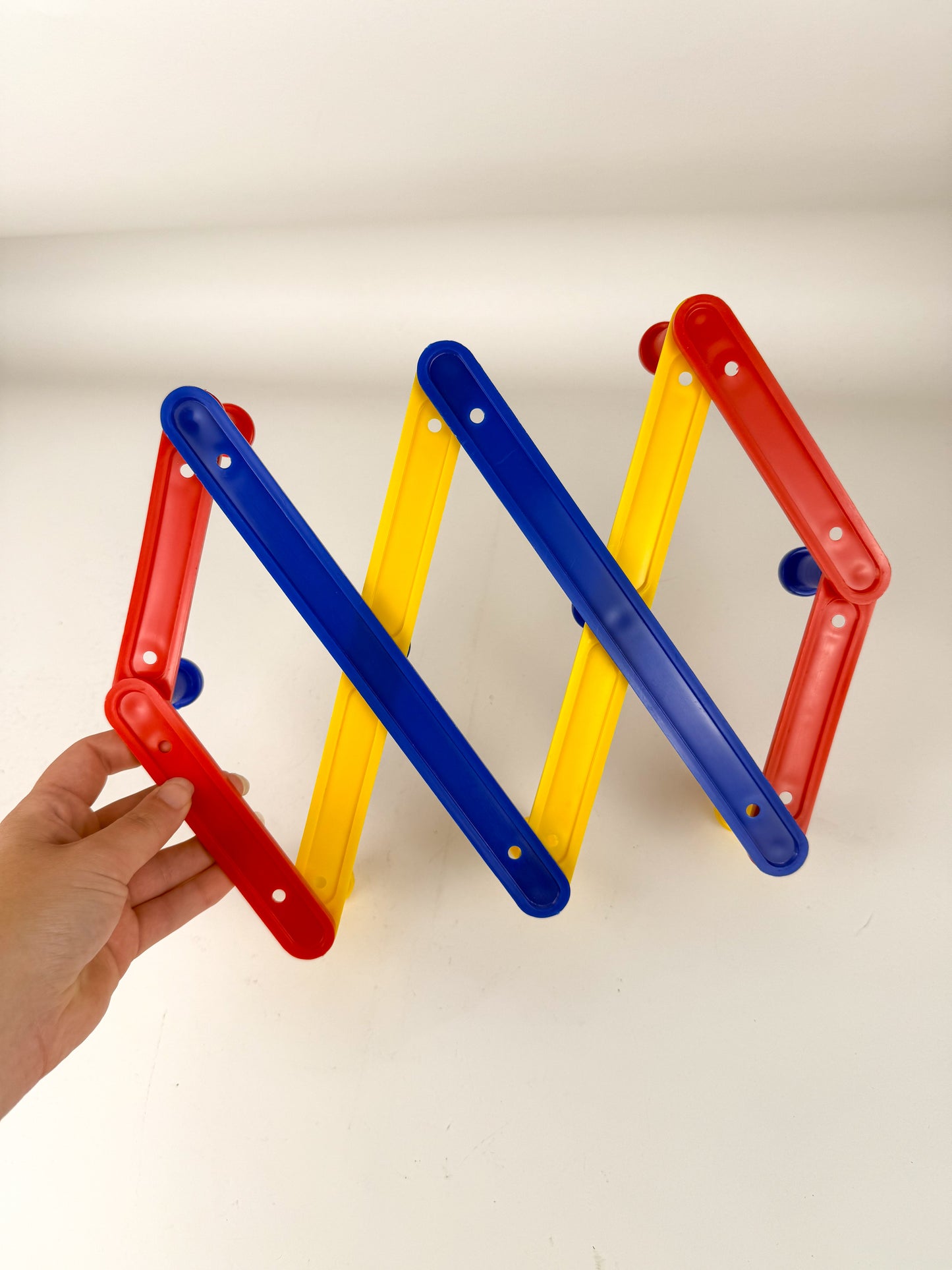 Vintage primary peg rack