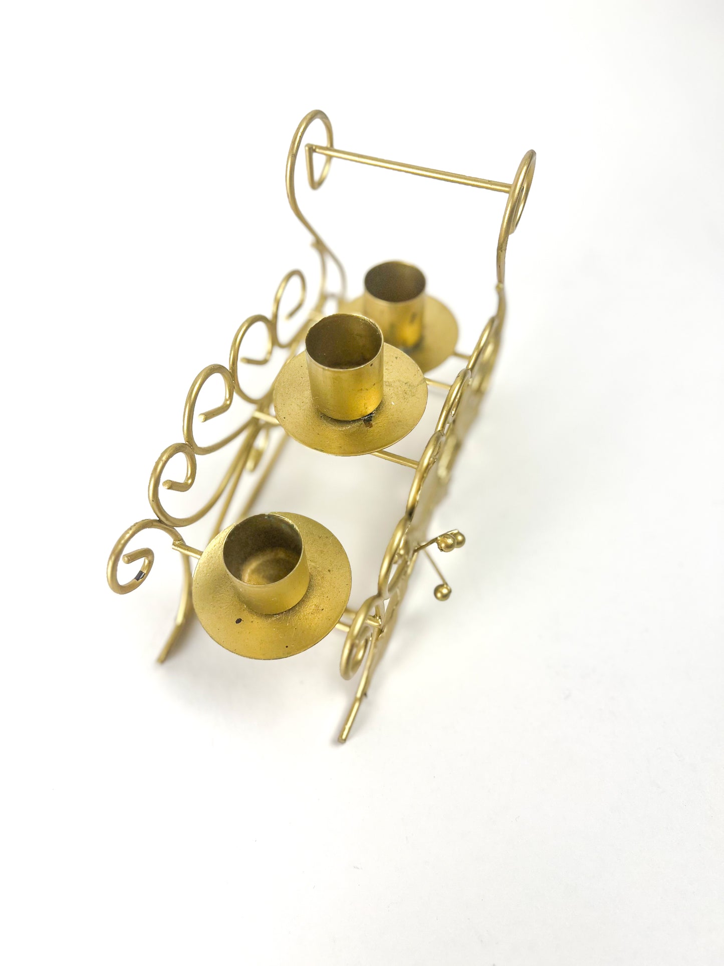 Brass sleigh candlestick holder