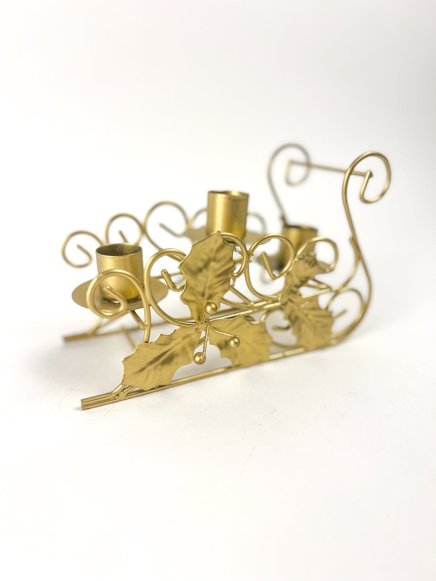Brass sleigh candlestick holder