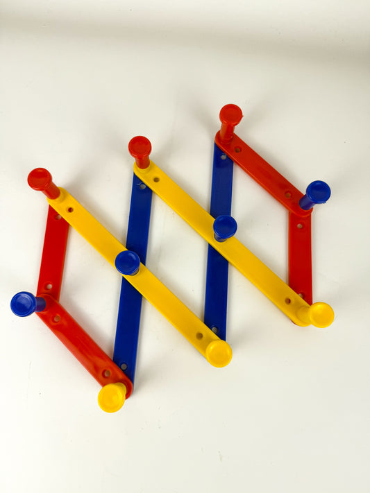 Vintage primary peg rack